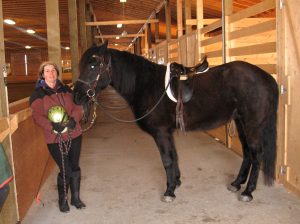 Ready for lesson! Rollie and me at indoor arena.